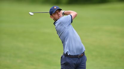 Jack Floydd hits an iron shot