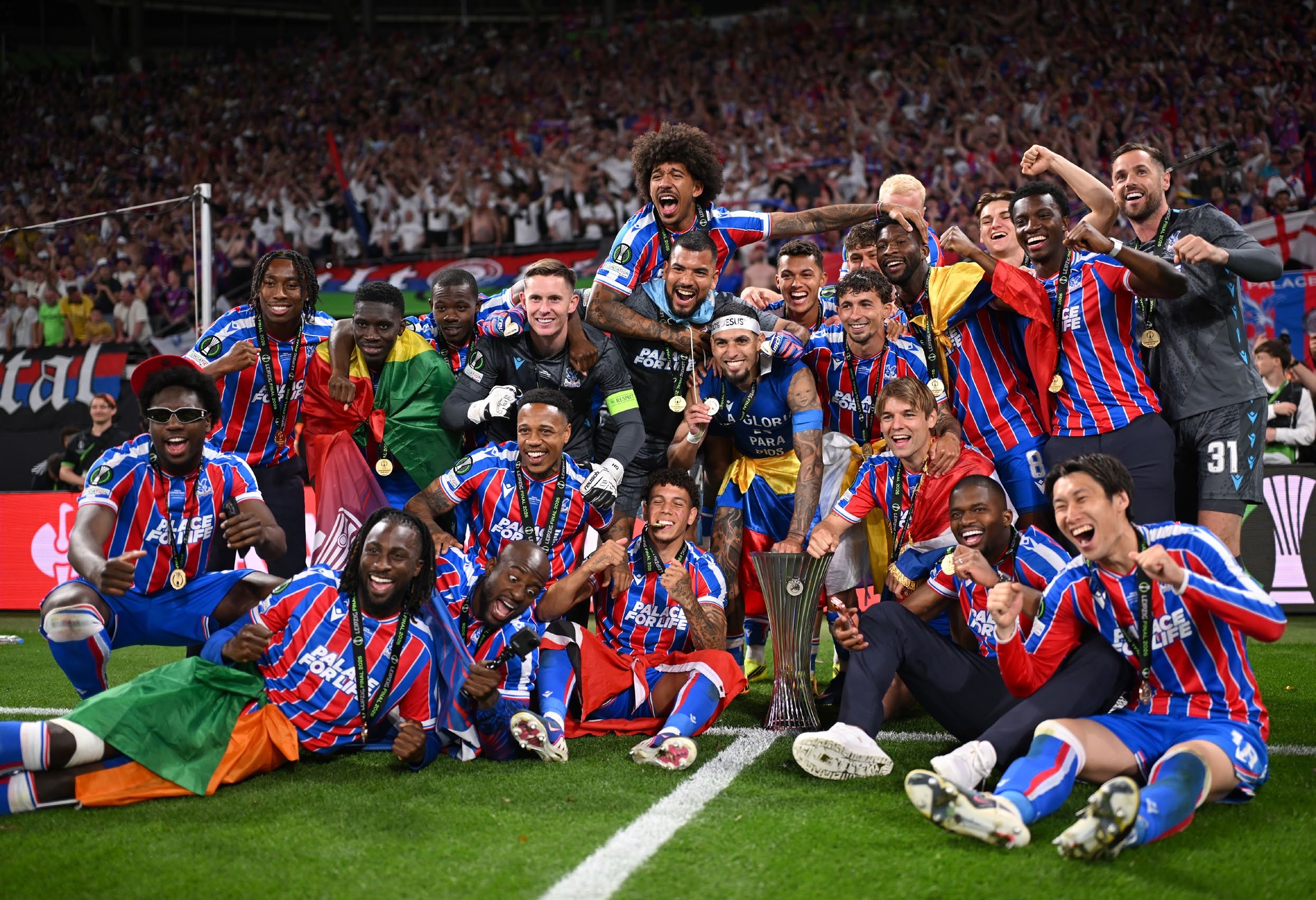Players of Crystal Palace celebrate with the UEFA Conference League Trophy. (Photo by Thomas Eisenhuth - UEFA/UEFA via Getty Images)