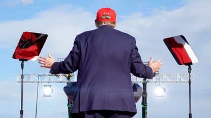 Donald Trump addresses supporters during a rally at Dayton International Airport in Vandalia, Ohio