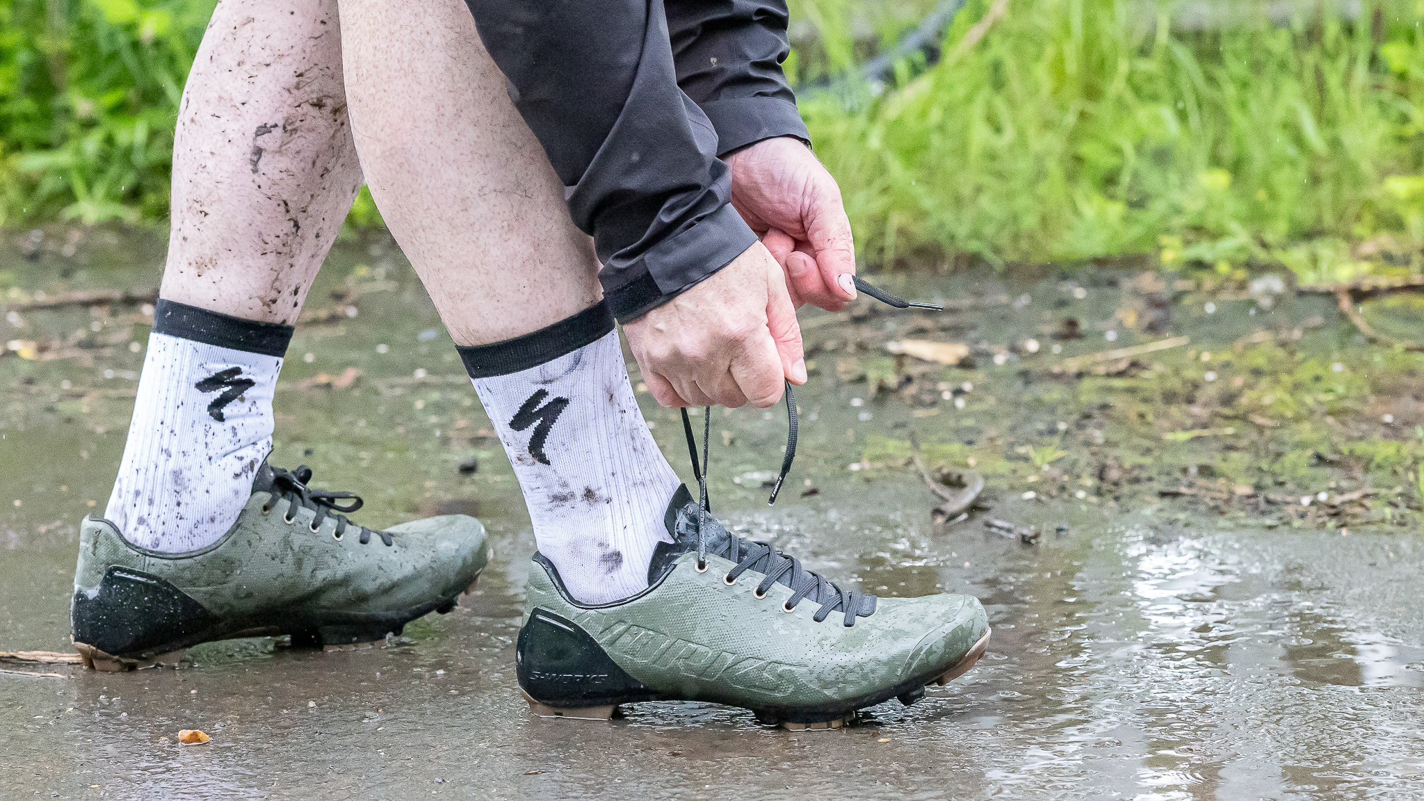 The S-Works Recon Lace Shoe in Oak Green, showing a side on view with the laces being tied