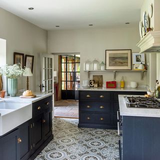 Kitchen with white wall and black cabinet