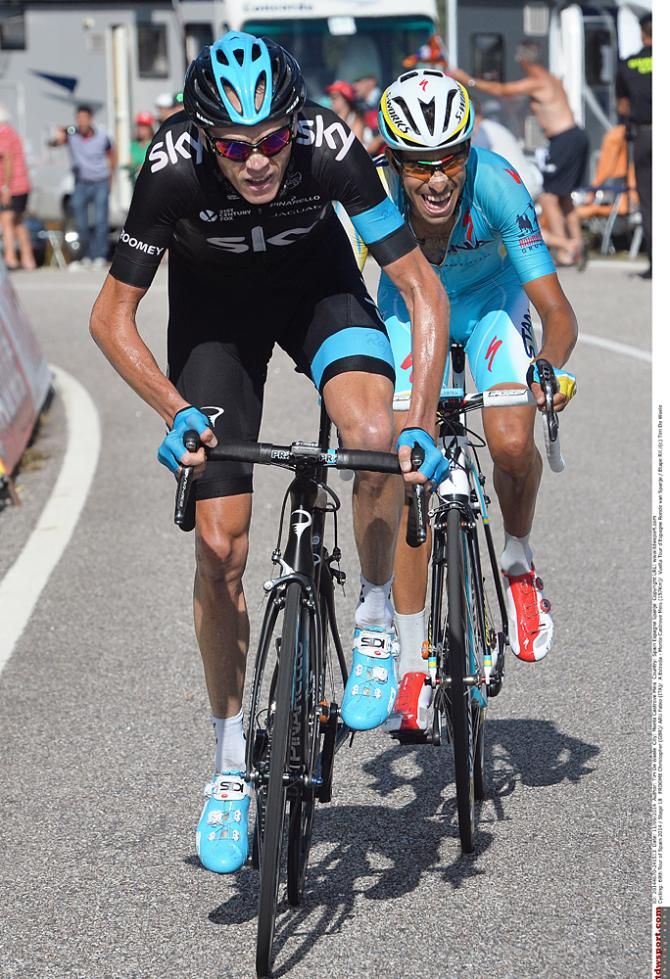 Chris Froome (Team Sky) leads Fabio Aru (Astana) over the final climb