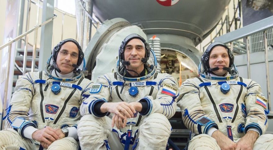 NASA astronaut Chris Cassidy (left) and Russian cosmonauts Anatoly Ivanishin (center) and Ivan Vagner (right) prepare for liftoff. 