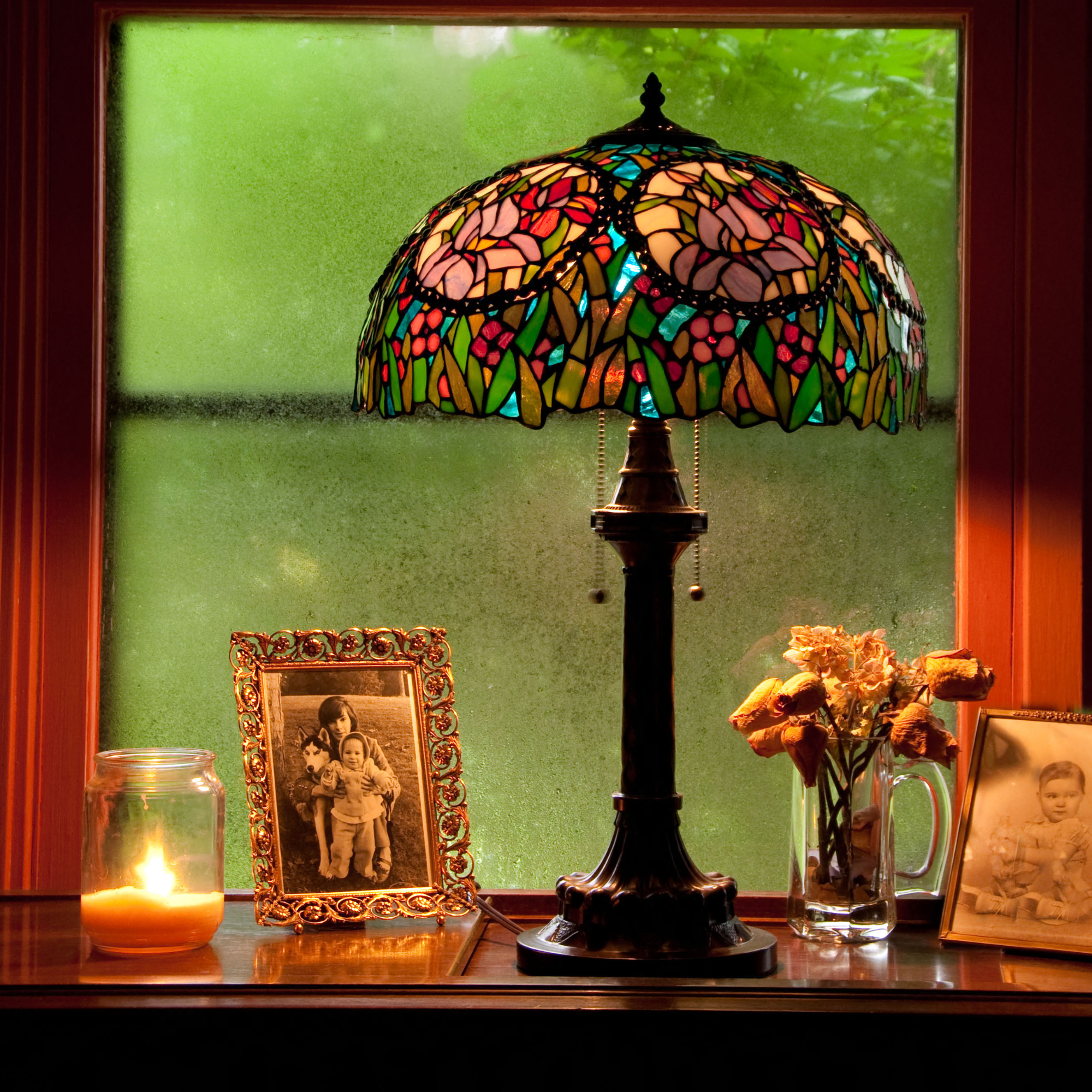 Tiffany lamp on a desk.