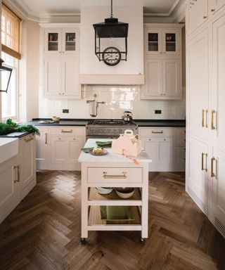 can you fit an island into a galley kitchen, white kitchen with small kitchen island on wheels herringbone floor, black countertops