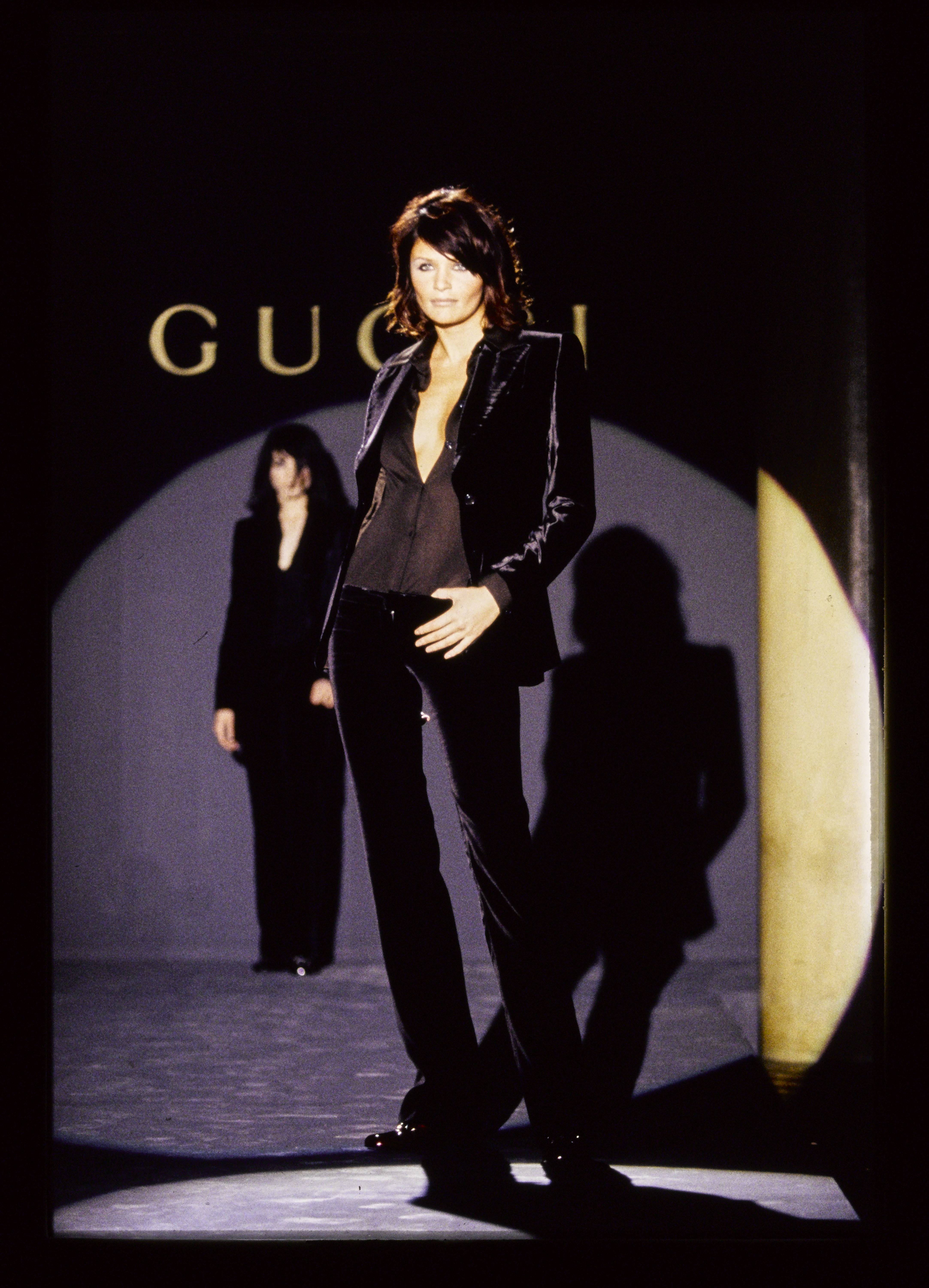 ITALY - AUGUST 01: Model walks Gucci's RTW (pret a porter) Fall 1995 Runway collection designed by Tom Ford.