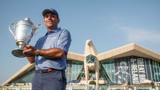 Francesco Molinari poses with the Hero Cup trophy