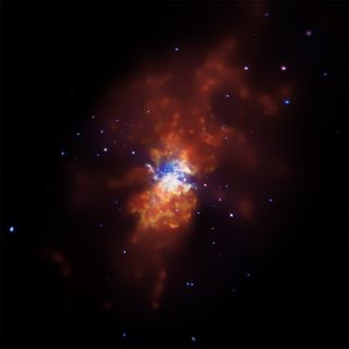 Messier 82 (M82) galaxy, known as a starburst galaxy, produces stars at rate tens or even hundreds of times faster than in normal galaxies. Astronomers believe that a brush with neighboring galaxy M81 millions of years ago, creating shock waves, set off t