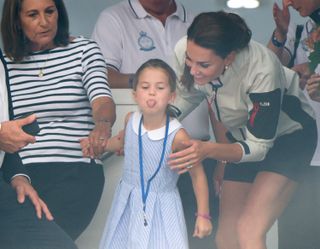 Carole Middleton, Princess Charlotte and Catherine, Duchess of Cambridge attend the presentation following the King's Cup Regatta on August 08, 2019 in Cowes, England.