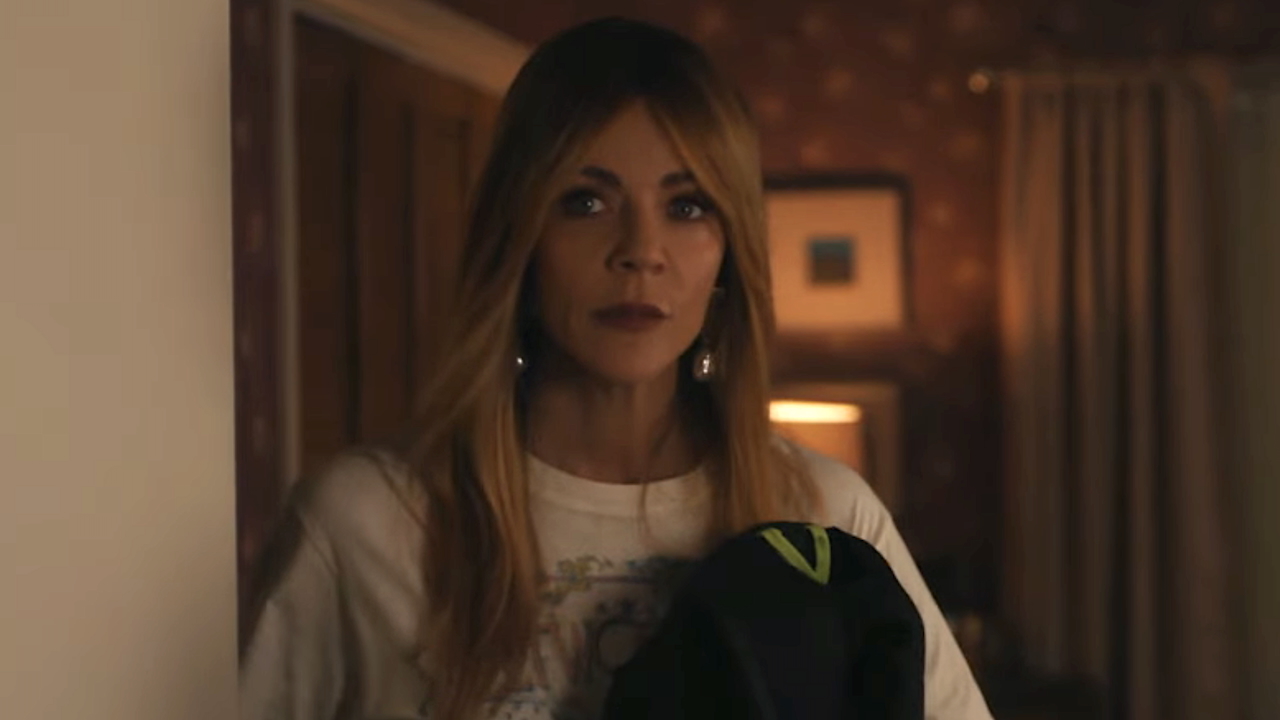 Morgan holding Roman&#039;s backpack in High Potential Season 2