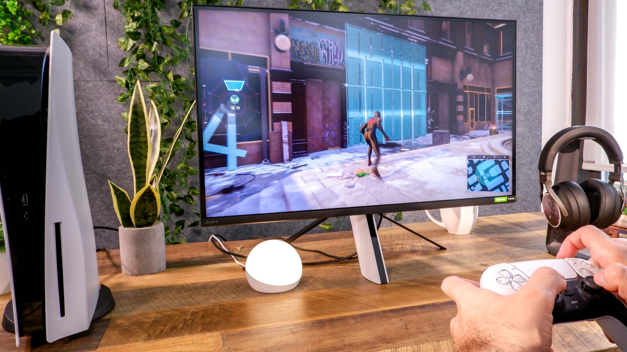 Sony Inzone M9 gaming monitor with Spider-Man: Miles Morales being played on the screen