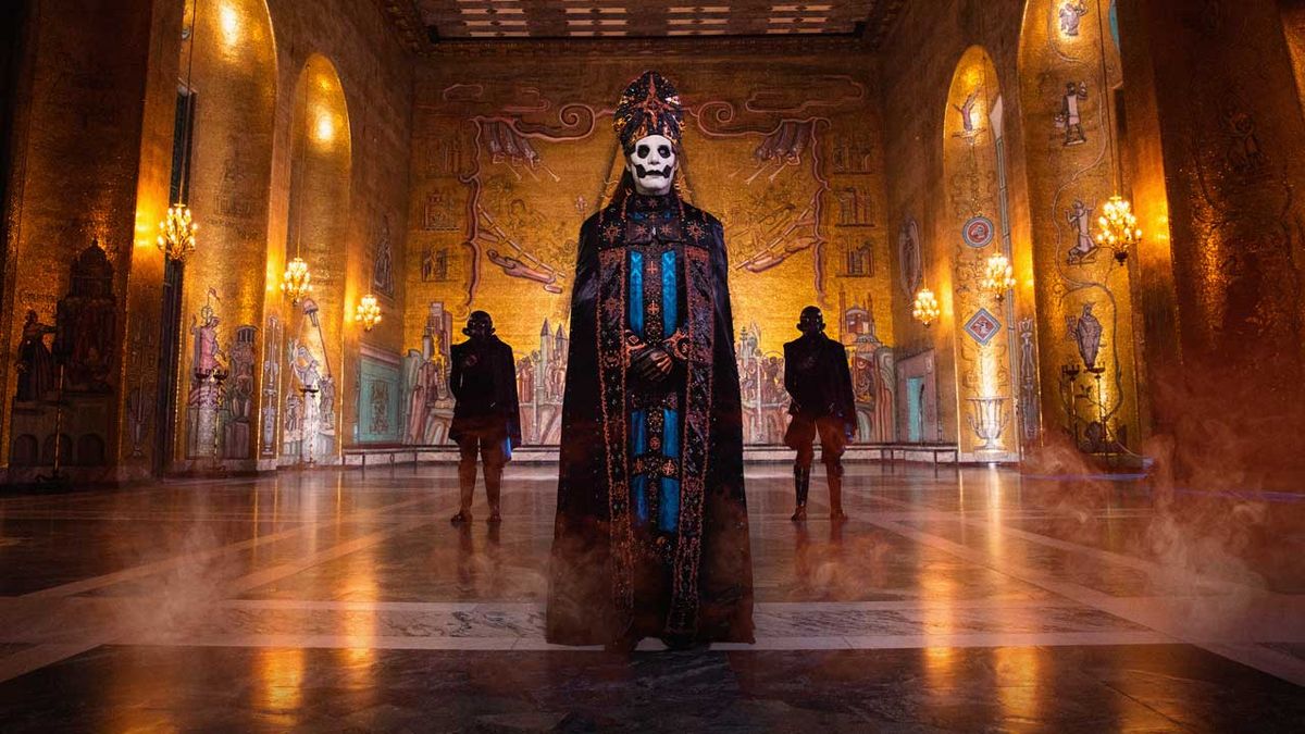 Tibias Forge in costume standing in a spooky cathedral