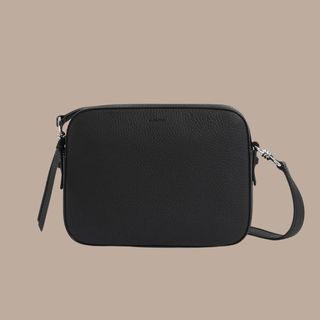 flat lay image of AllSaints bag 