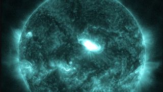 An image of the sun showing a large solar flare