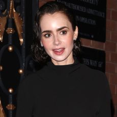LONDON, ENGLAND - OCTOBER 30: Lily Collins leaving the "Barcelona" West End press night at the Duke Of York’s Theatre on October 30, 2024 in London, England. 