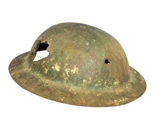 The helmet of Signaller John Clarkson of the 10th Canadian 2nd Brigade