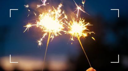 Two sparkles together lit against the night's sky, representing how to make New Year's resolutions