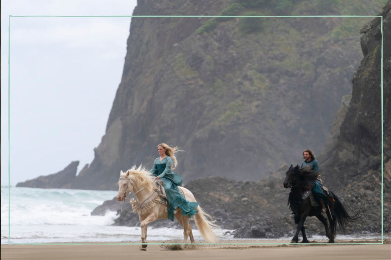 Morfydd Clark as Galadriel and Lloyd Owen as Elendil in The Rings of Power 