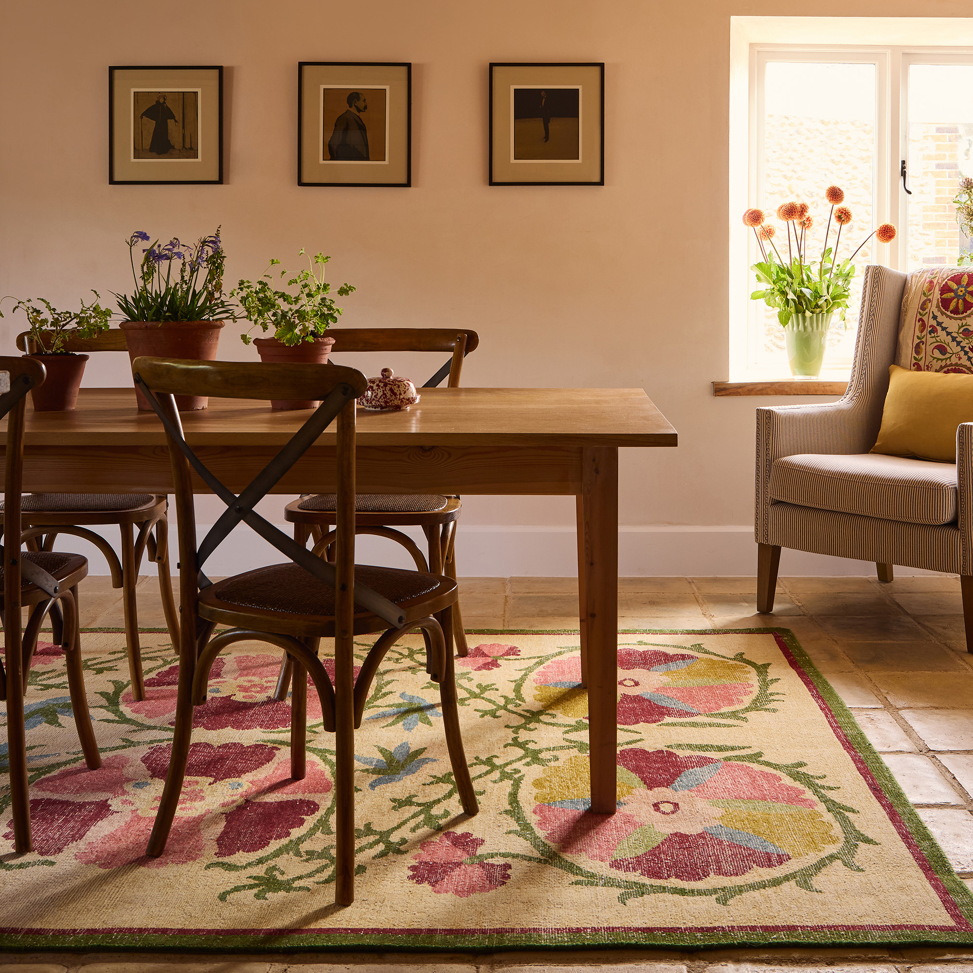 suzani style rug on the floor in dining room