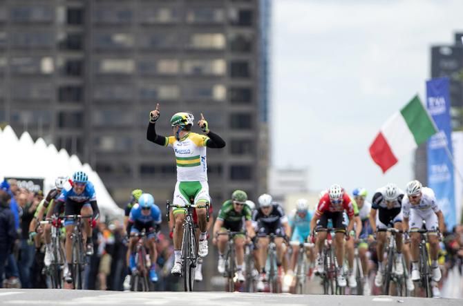 Simon Gerrans (Orica-GreenEdge) checks to see his margin of victory before his big celebration