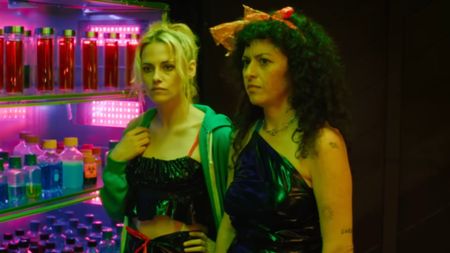 Kristen Stewart and Alia Shawkat wearing trash bag outfits in The Wrong Girls. 