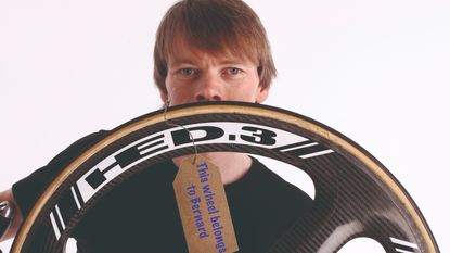 Dr Hutch holding a wheel with 'owned by Bernard' label
