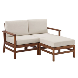 loveseat with tan cushions and a dark wood frame and a matching ottoman