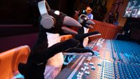 The Muppet penguins running the sound board for Electric Mayhem in the ride queue for Rock'n Roller Coaster at Walt Disney World
