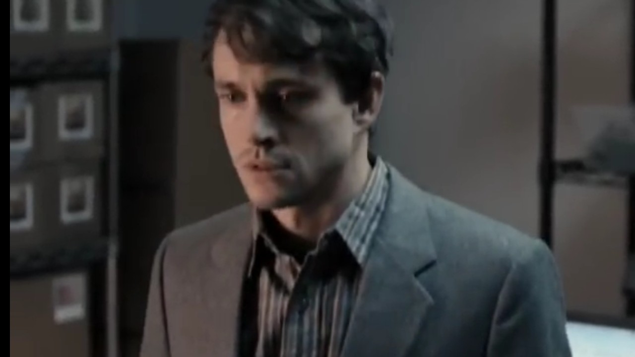 Hugh Dancy with a concerned look on his face in Adam