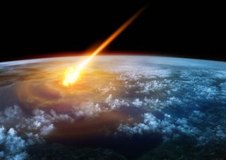 Glowing meteor, fireball entering Earth's atmosphere.