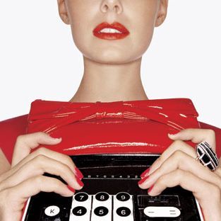 model with red calculator purse