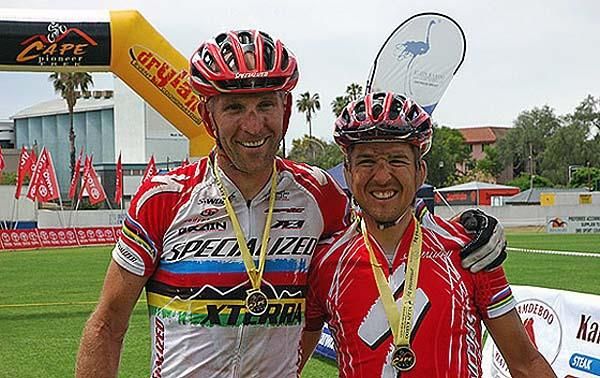 Teammates Bobby Behan and Christoph Sauser at the finish of the Cape Pioneer Trek