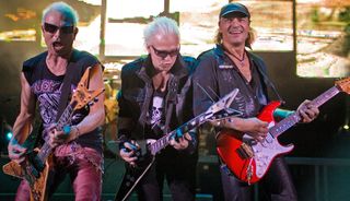 (from left) Rudolf Schenker, Michael Schenker, and Matthias Jabs of the Scorpions perform onstage at the Hammersmith Apollo in London