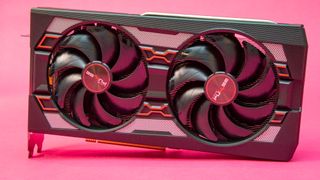 a graphics card against a pink background
