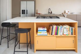 Ikea kitchen with custom doors by Husk and a yellow island