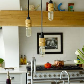 hanging bulbs with black wire in kitchen