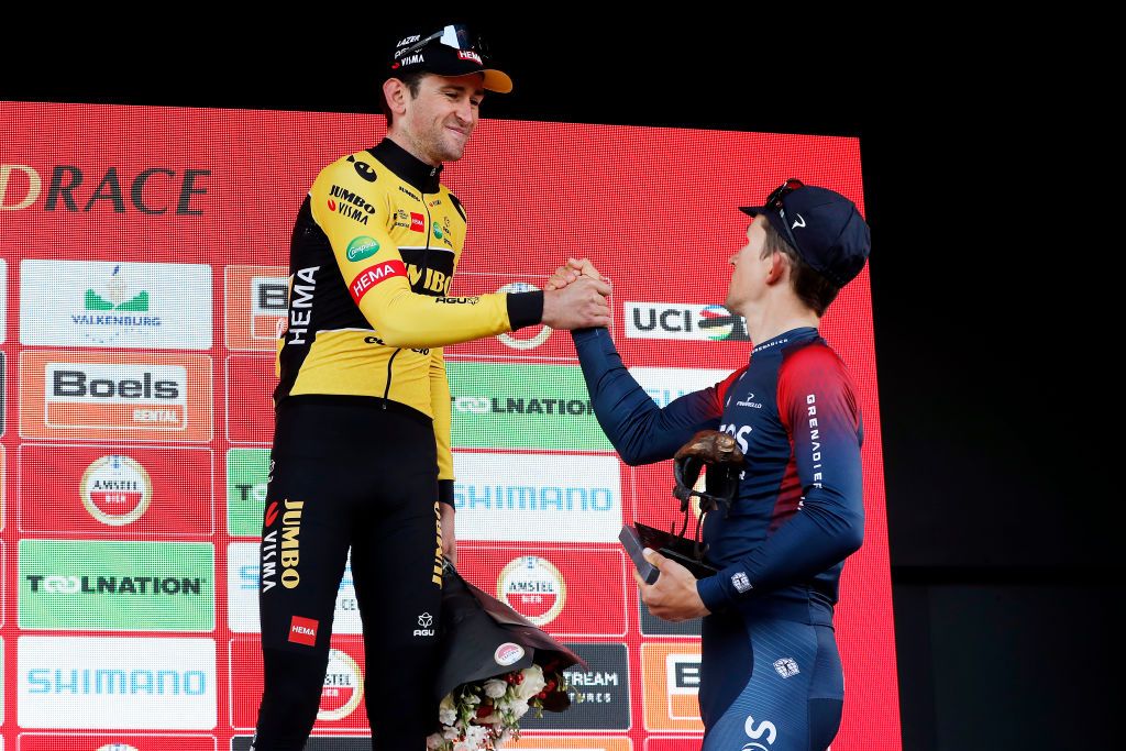 VALKENBURG NETHERLANDS APRIL 10 Race winner Michal Kwiatkowski of Poland and Team INEOS Grenadiers R and Tiesj Benoot of Belgium and Team Jumbo Visma L on third place drink beer to celebrate on the podium during the podium ceremony after the 56th Amstel Gold Race 2022 Mens Elite a 2541km one day race from Maastricht to Valkenburg AGR2022 WorldTour on April 10 2022 in Valkenburg Netherlands Photo by Bas CzerwinskiGetty Images