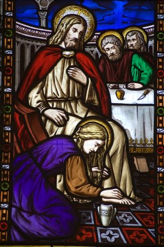 The Gospel of Jesus’s Wife has received a huge amount of attention since its discovery in 2012. This stained glass window depicts Mary Magdalene washing the feet of Jesus.