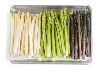Tray with White Green and Dark Purple Asparagus