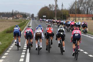 WEVELGEM BELGIUM MARCH 28 Niki Terpstra of Netherlands and Team Total Direct Energie Julien Duval of France and AG2R Citren Team Fumiyuki Beppu of Japan and Team EF Education Nippo Philippe Gilbert of Belgium and Team Lotto Soudal The Peloton in Echelons Formation due Crosswind during the 83rd GentWevelgem in Flanders Fields 2021 Mens Elite a 254km race from Ypres to Wevelgem GWE21 GWEmen FlandersClassic on March 28 2021 in Wevelgem Belgium Photo by Tim de WaeleGetty Images