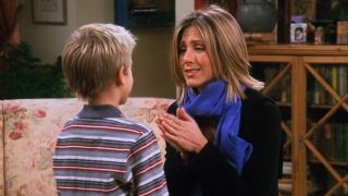 Rachel (Jennifer Aniston) talks to Ben (Cole Sprouse) on Friends.