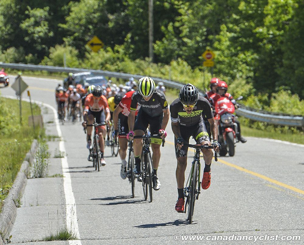 Luis Lemus (Cycling Academy Team) jumps away at the base of the climb