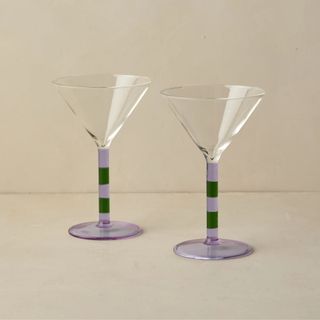 pair of martini glasses with purple and green striped stem