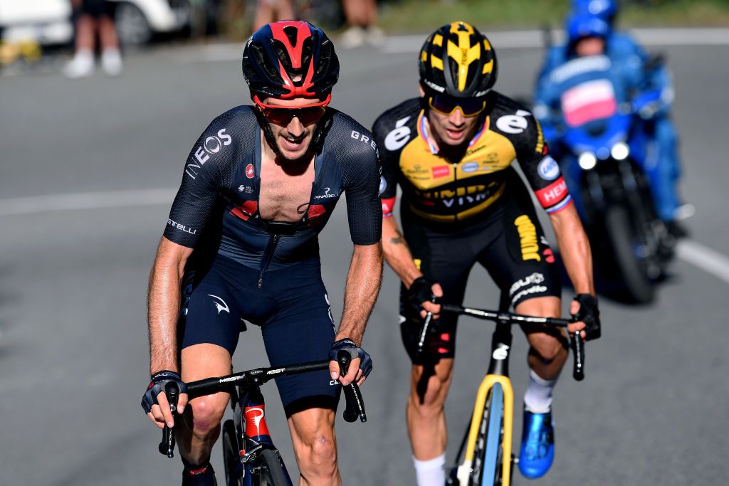 MILAN ITALY OCTOBER 06 LR Adam Yates of United Kingdom and Team INEOS Grenadiers and Primoz Roglic of Slovenia and Team Jumbo Visma compete in the breakaway during the 102nd MilanoTorino 2021 a 190km race from Magenta to Torino Superga 669m MilanoTorino on October 06 2021 in Milan Italy Photo by Tim de WaeleGetty Images