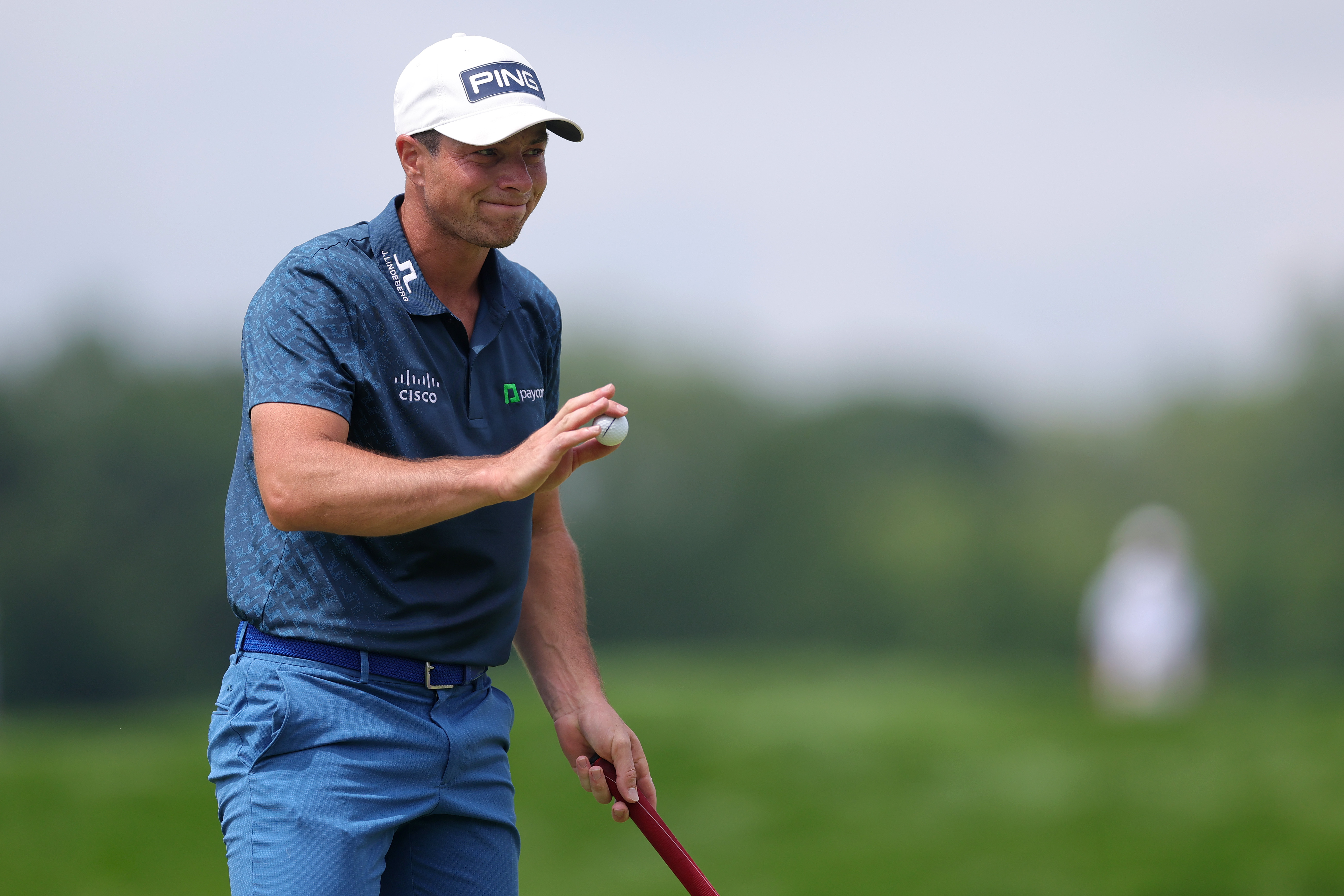 Viktor Hovland waves to the crowd