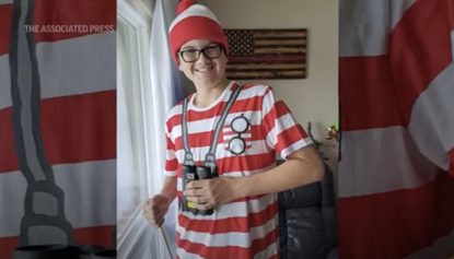 Logan Houghtelling dressed up as Waldo.