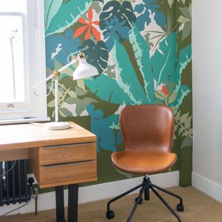 Green and blue painted mural by Living Wall Murals