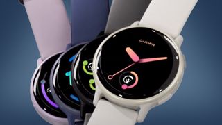 Four Garmin Vivoactive 5 watches on a blue background