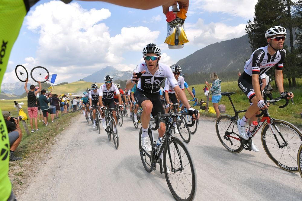 Luke Rowe gets some food during stage 10 at the Tour de France