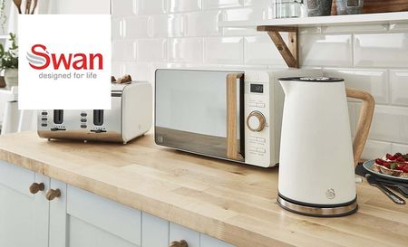 swan logo top left with a picture of white kitchen appliances like a kettle, microwave and toaster